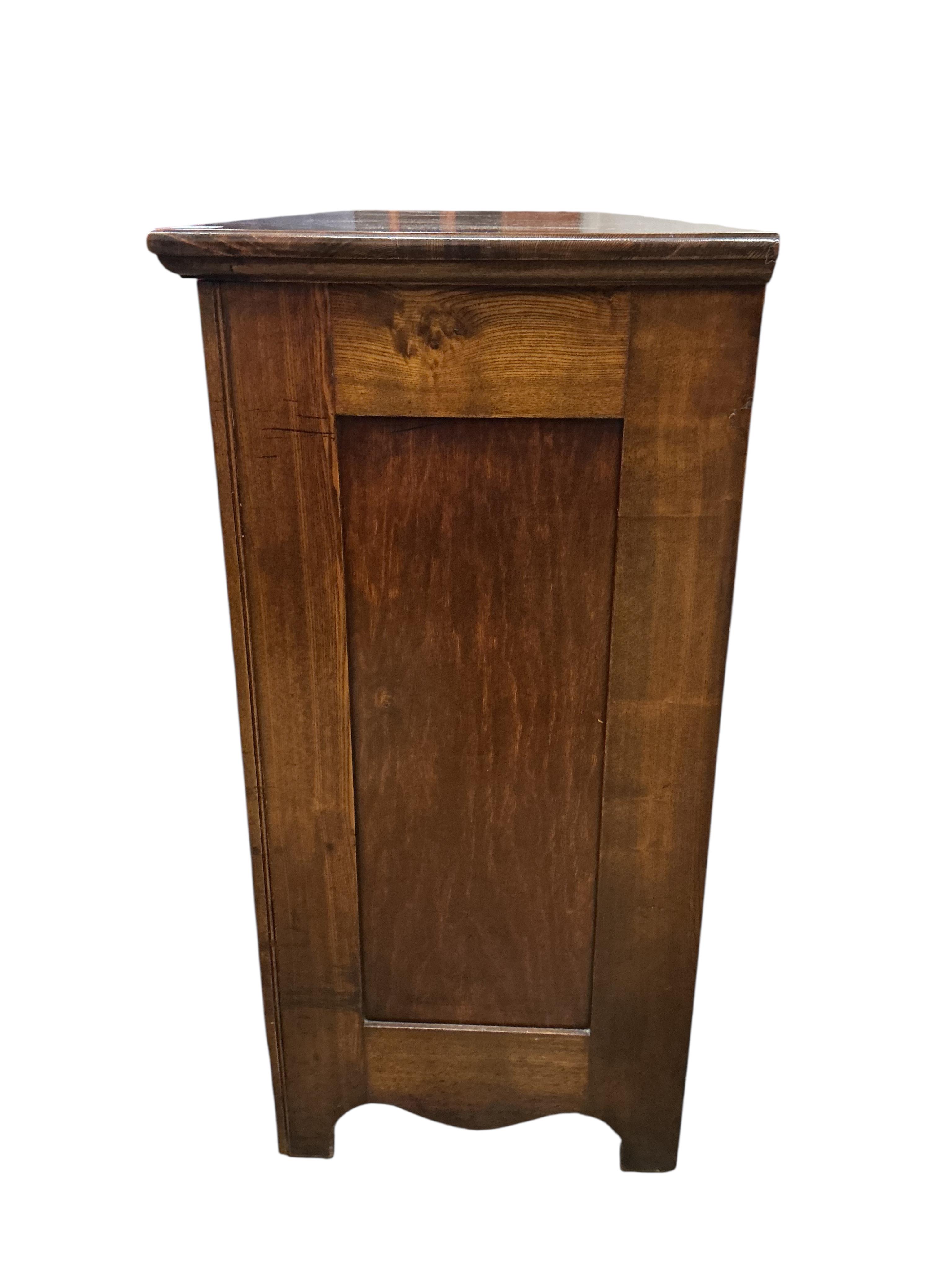 An Arts & Crafts oak chest of five drawers, width 97cm, depth 49cm, height 102cm